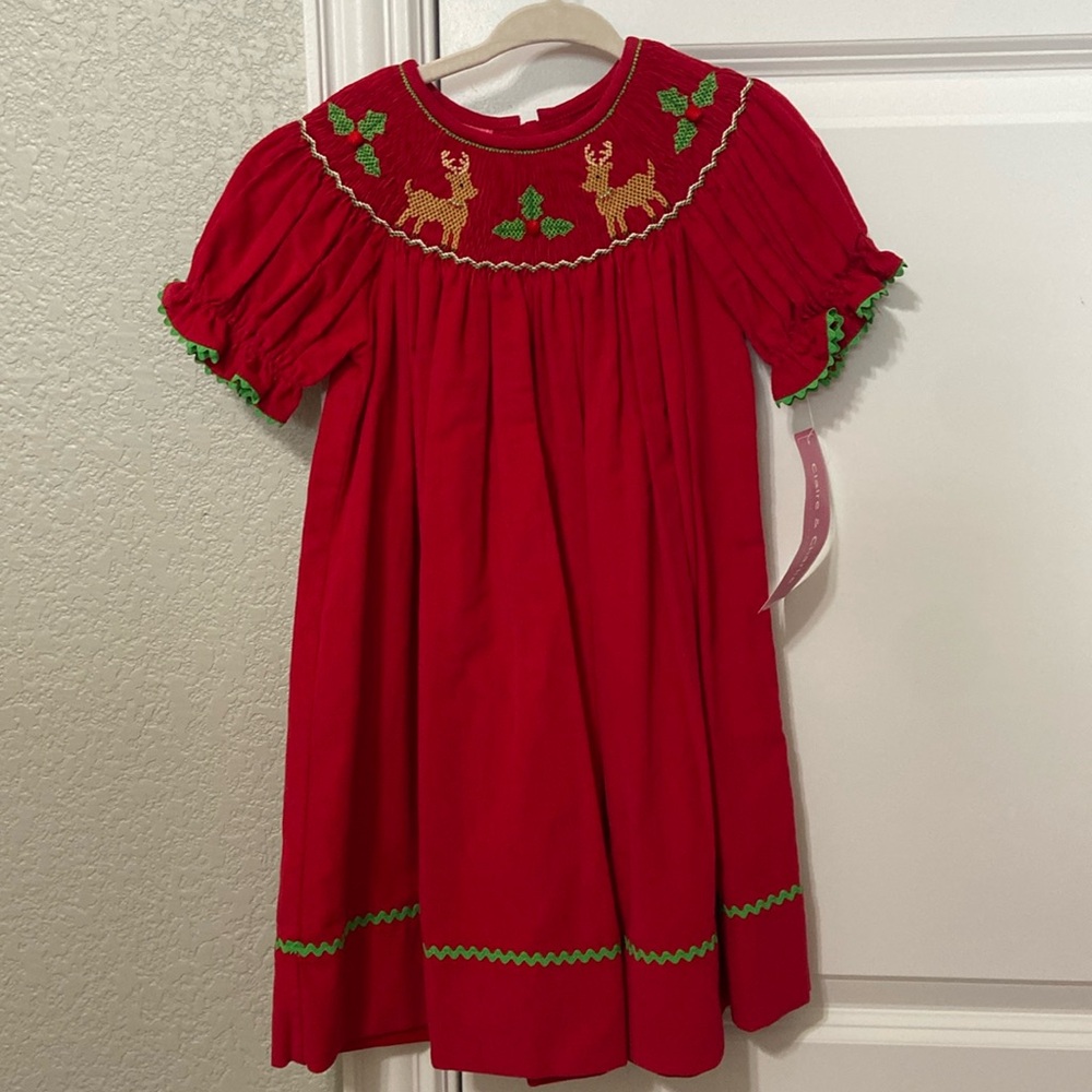 Red corduroy smocked reindeer & holly dress